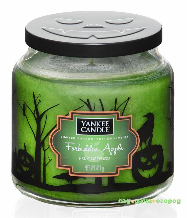 Фото Аромасвеча в банке ср.запретное яблоко Yankee candle 1555807e