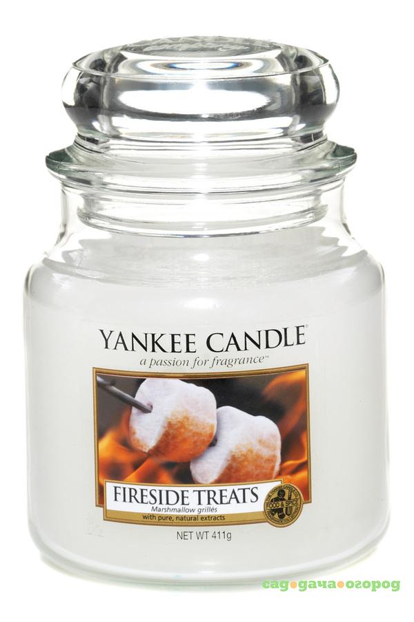 Фото Ароматическая свеча Yankee candle средняя Лакомства у камина 411 г