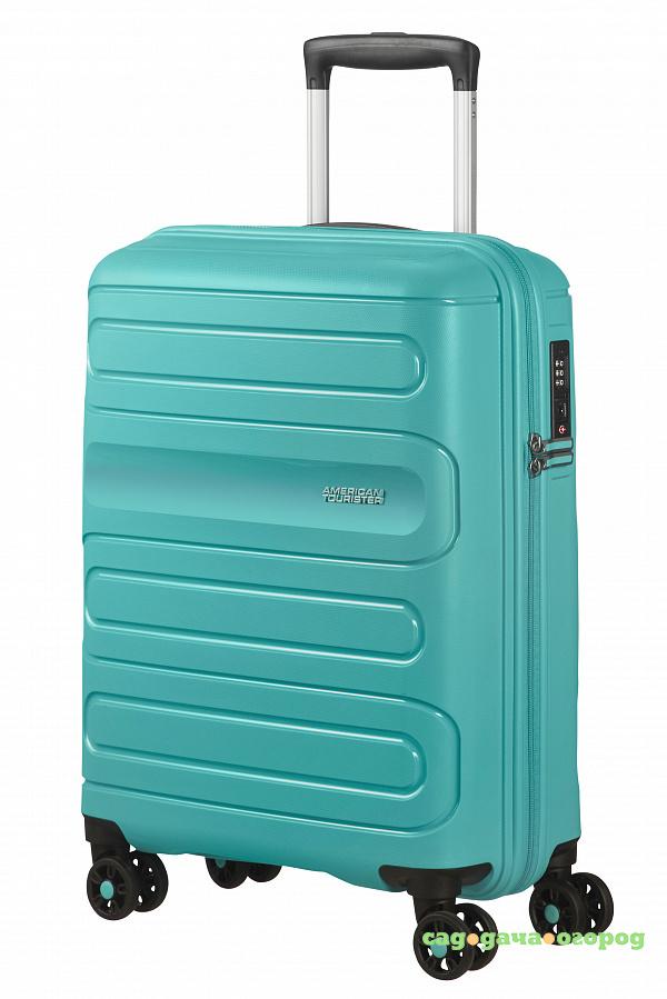 Фото Чемодан American Tourister Sunside бирюзовый S